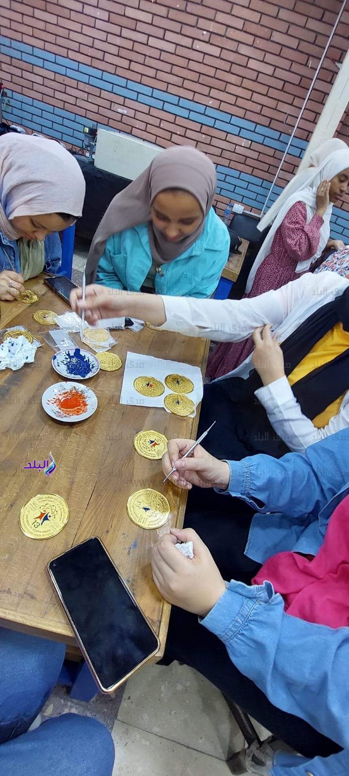 كلية الفنون التطبيقية جامعة حلوان تنفذ ميداليات وهدايا اسبوع شباب الجامعات