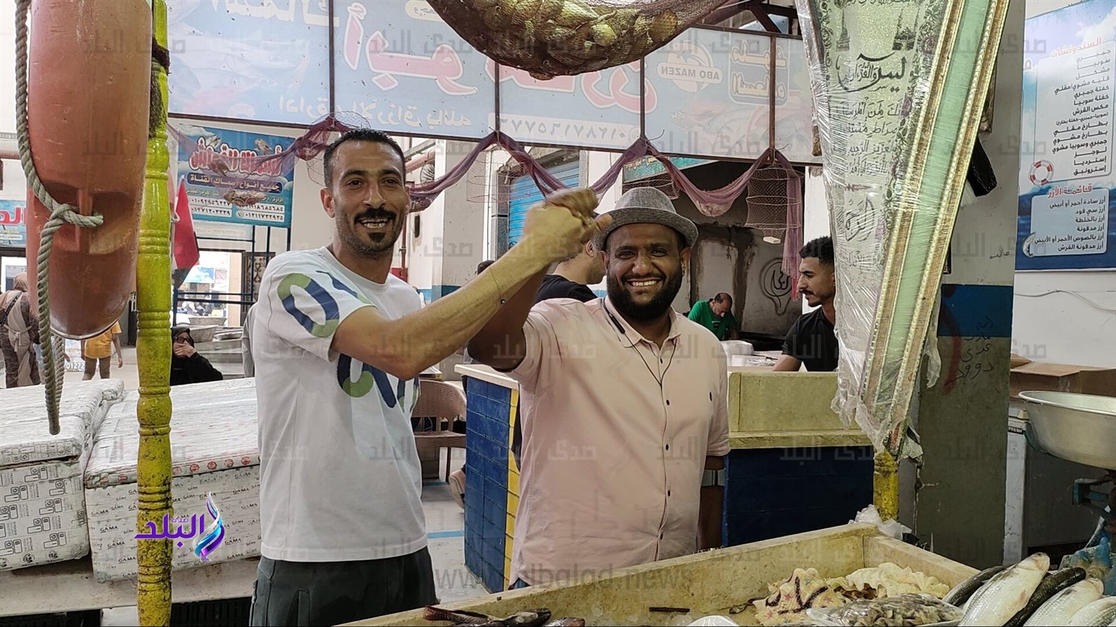 خلال زيارة سائحين يمنين سوق السمك بالإسماعيلية 