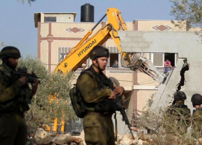 إسرائيل تهدم 12 مبني فلسطينيا إسرائيل تهدم 12 مبني فلسطينيا