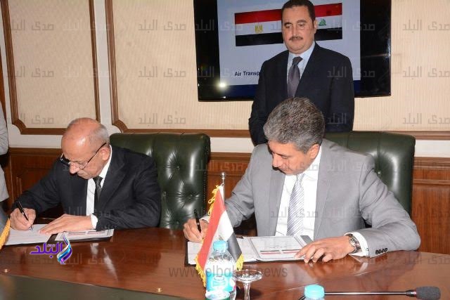 جانب من توقيع البروتوكول جانب من توقيع البروتوكول