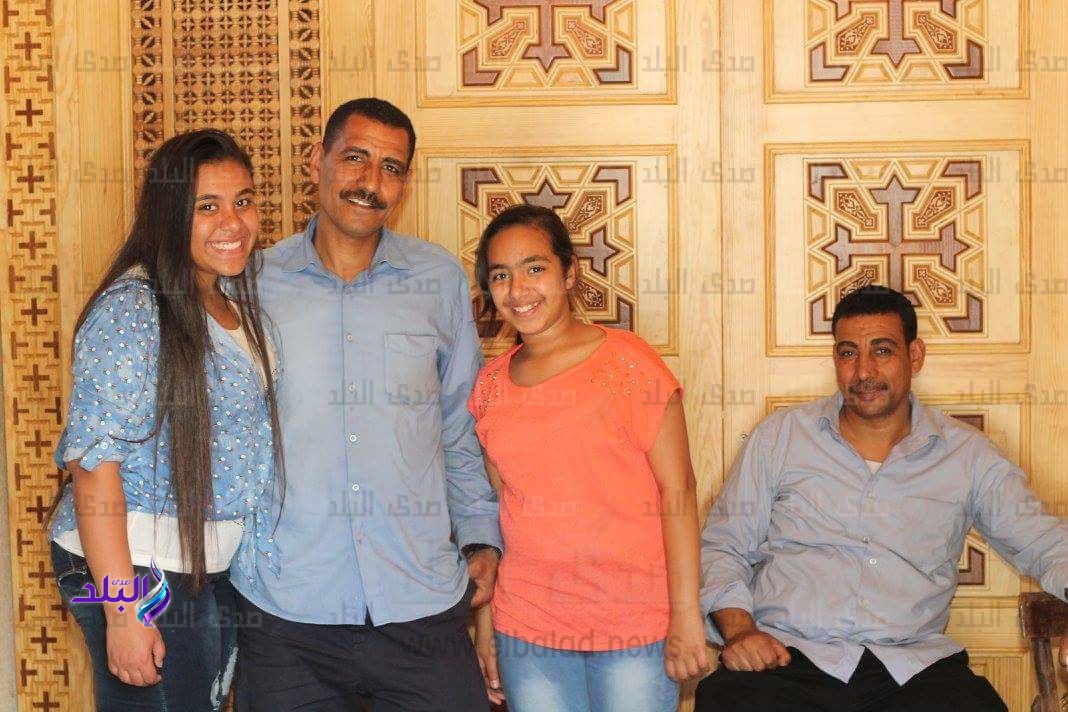 شهيد البطرسية يتوسط العائلة