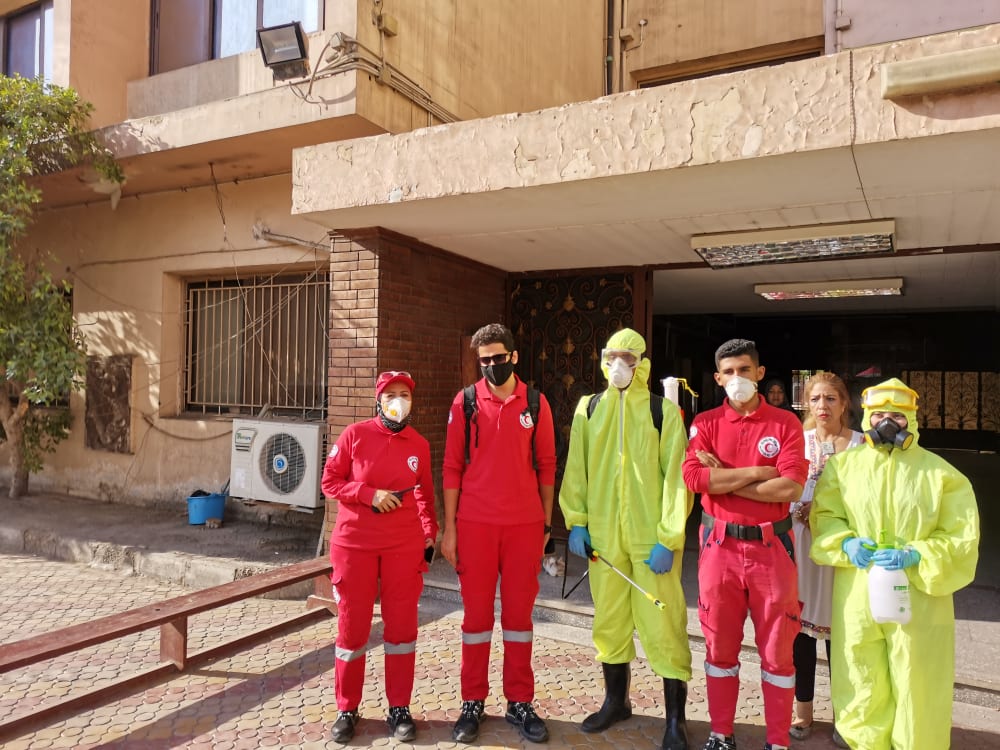 الهلال الأحمر يعقم لجنة كلية التربية للطفولة بالدقي