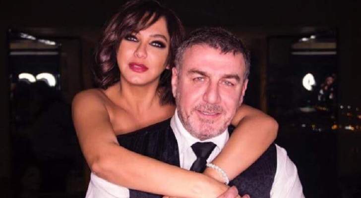 سلاف فواخرجي وزوجها