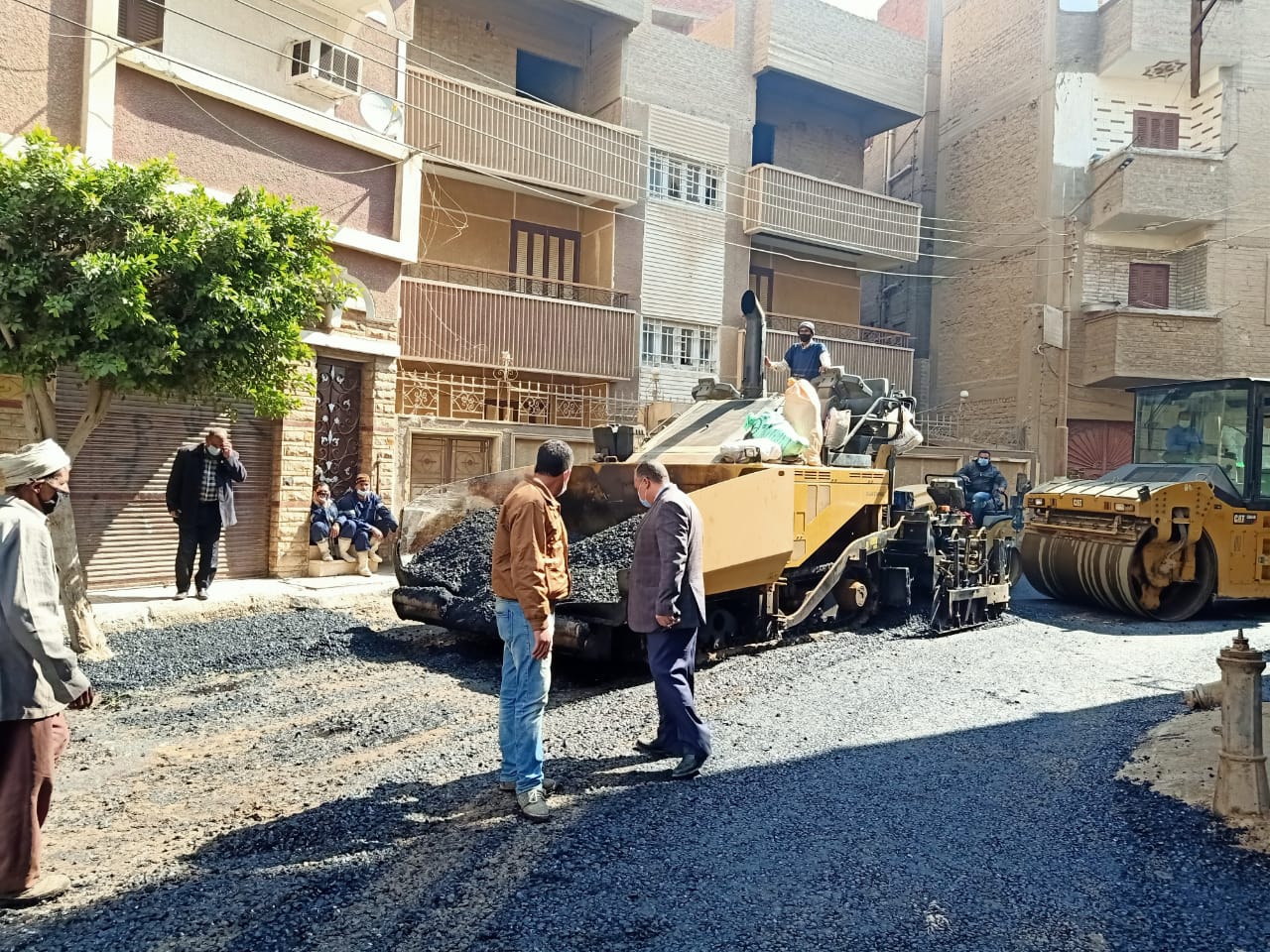 أعمال الرصف بمركز القوصية