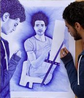  أحمد عاطف عبد اللاه يرسم نفسه 