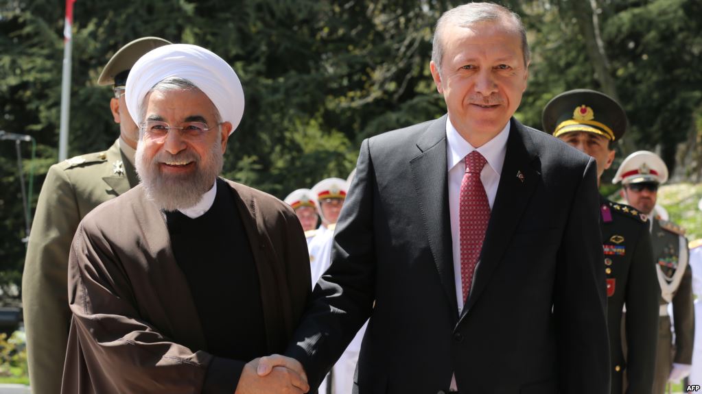 الرئيس الإيراني حسن روحاني مع نظيره التركي رجب طيب أردوغان