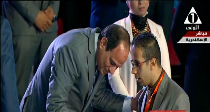 السيسي مع الشاب محمد خالد