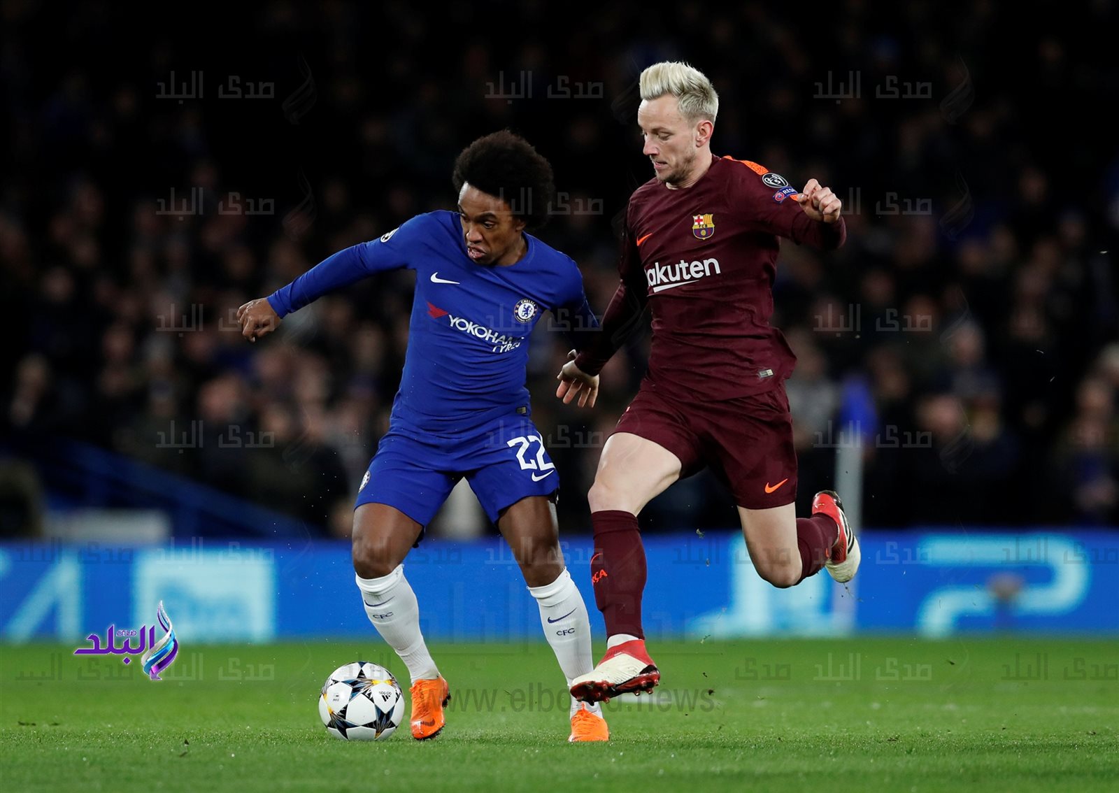 ويليان لاعب تشيلسي وراكيتيتش لاعب برشلونة  