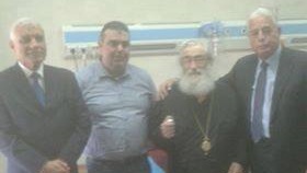 اللواء خالد فودة محافظ جنوب سيناء أثناء زيارة الأنبا 