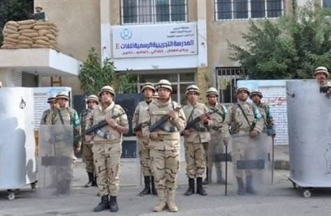 صورة لعناصر القوات المسلحة لتأمين الانتخابات صورة لعناصر القوات المسلحة لتأمين الانتخابات