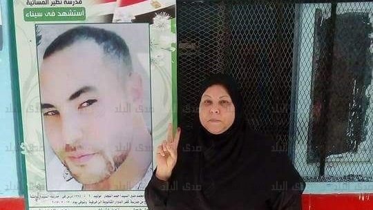 والدة الشهيد مصطفى حمدان والدة الشهيد مصطفى حمدان