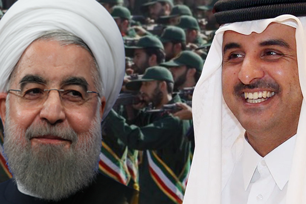 تميم بن حمد وحسن روحاني وفي الخلفية قوات من الحرس الثوري تميم بن حمد وحسن روحاني وفي الخلفية قوات من الحرس الثوري