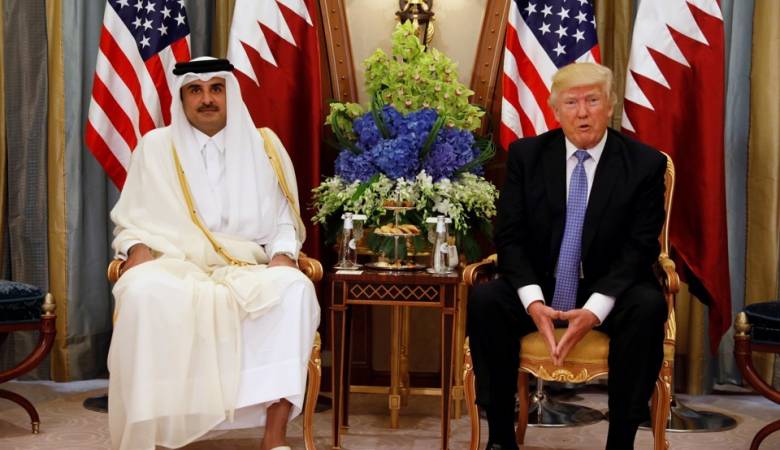 الرئيس الأمريكى ونظيره القطري تميم الرئيس الأمريكى ونظيره القطري تميم