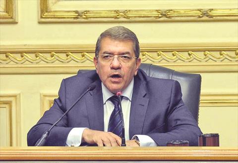 وزيرا المالية عمرو الجارحي وزيرا المالية عمرو الجارحي