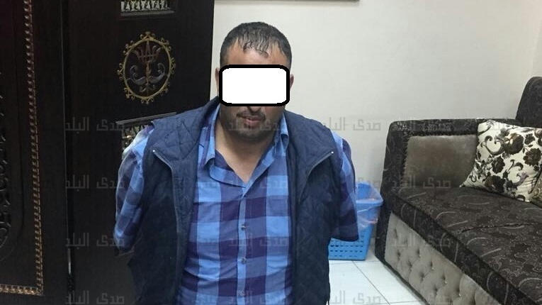 المتهم بعد ضبطه المتهم بعد ضبطه