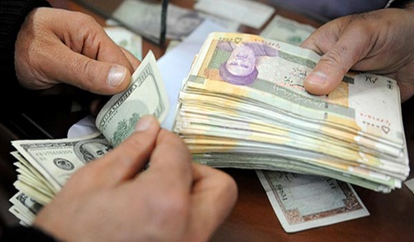 ريال إيراني ودولار أمريكي ريال إيراني ودولار أمريكي