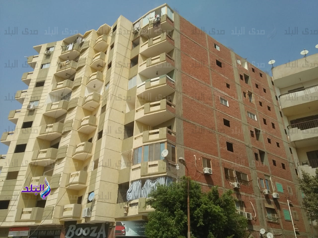 إزالة عقار مخالف مكون من 10 طوابق بالمعصرة .. صور