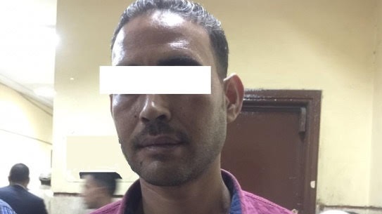 المتهم عقب القبض عليه المتهم عقب القبض عليه