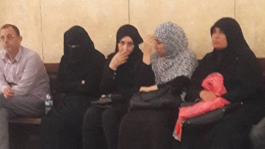 زوجة المتهم بقتل طفليه زوجة المتهم بقتل طفليه