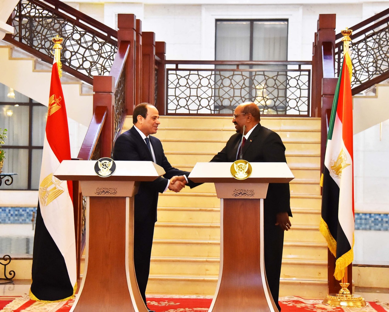 الرئيس السيسي والرئيس البشير الرئيس السيسي والرئيس البشير