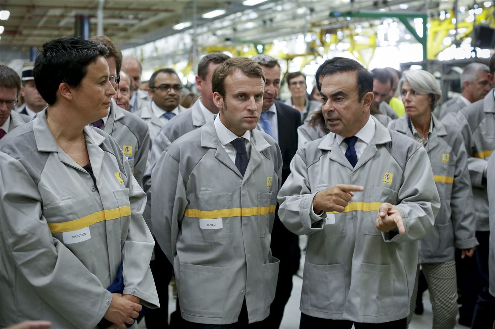 الرئيس الفرنسي ماكرون وكارلوس غصن