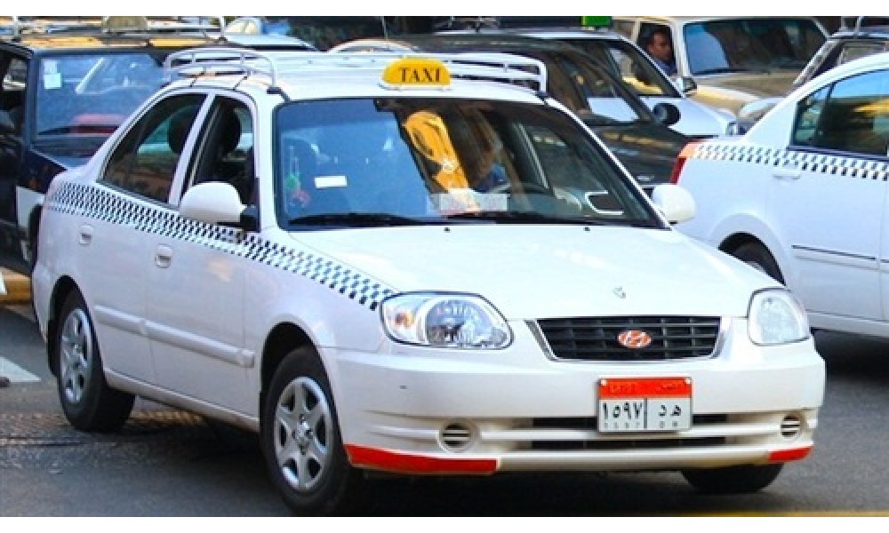 التاكسي الأبيض