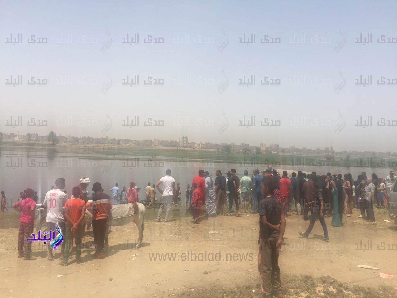 أثناء استخراج جثة الطالب من نهر النيل بسوهاج