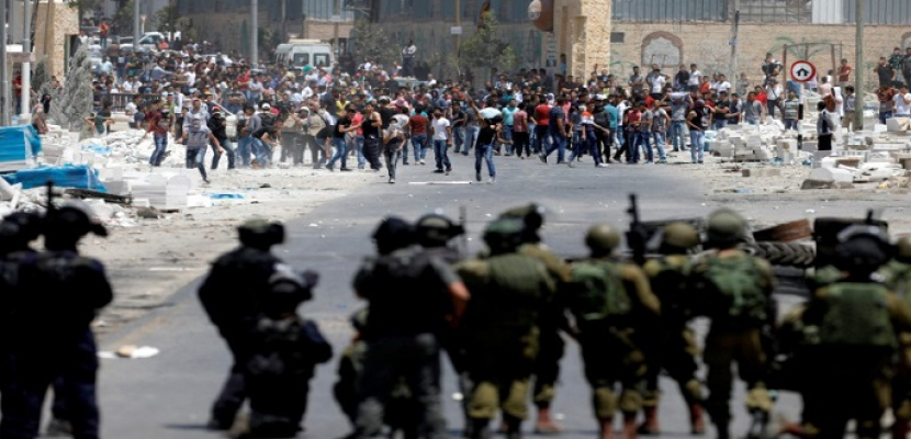 اشتباكات الفلسطينيين - صورة أرشيفية  اشتباكات الفلسطينيين - صورة أرشيفية