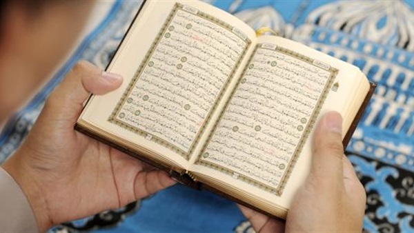 قراءة القرآن من المصحف دون وضوء