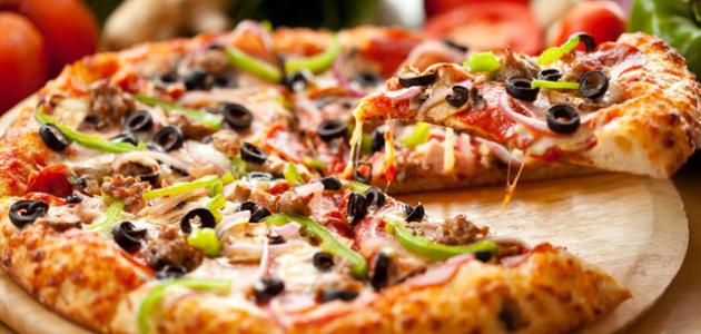 طريقة عمل البيتزا فى المنزل .. 9 وصفات مختلفة لأشهر الأنواع