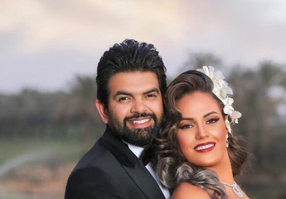أحمد الطاهرى وزوجته 