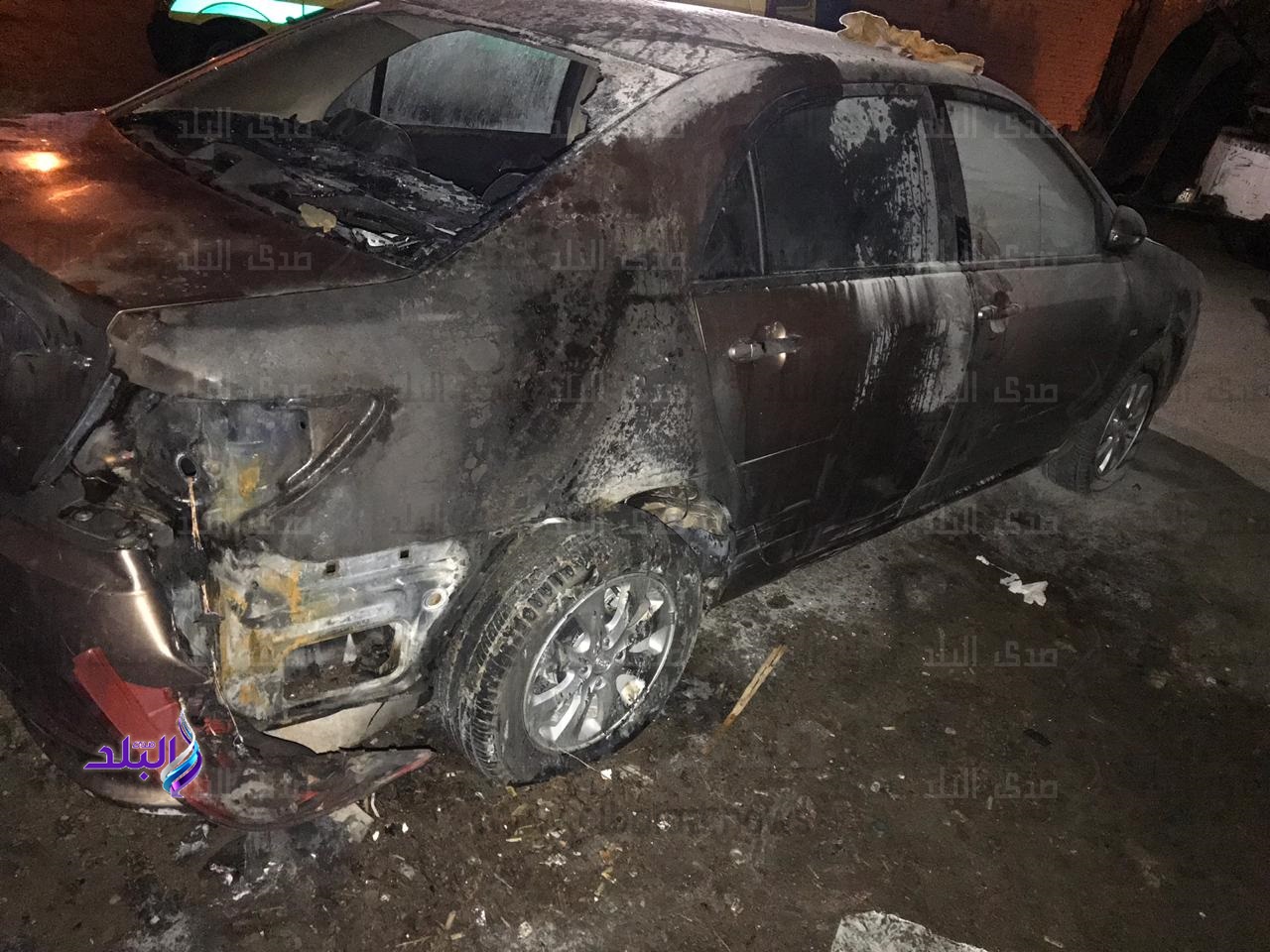 السيارة المحترقة فى واقعة ذبح سائق بمصر الجديدة
