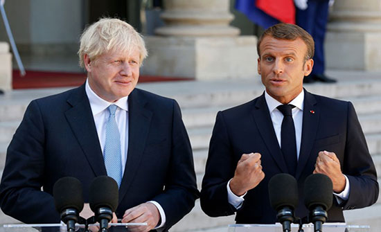 الرئيس الفرنسي ورئيس الوزراء البريطاني 
