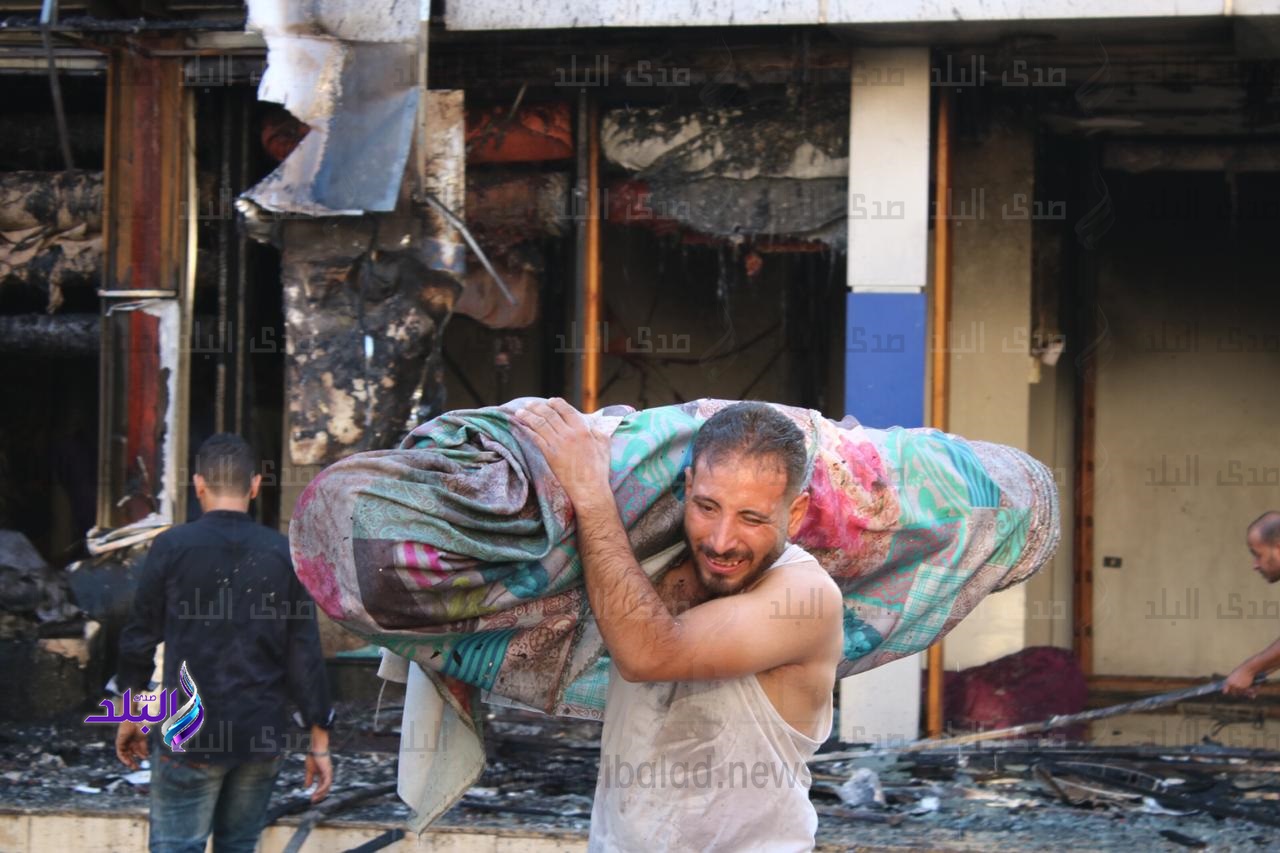 20 صورة من حريق الوكالة 20 صورة من حريق الوكالة