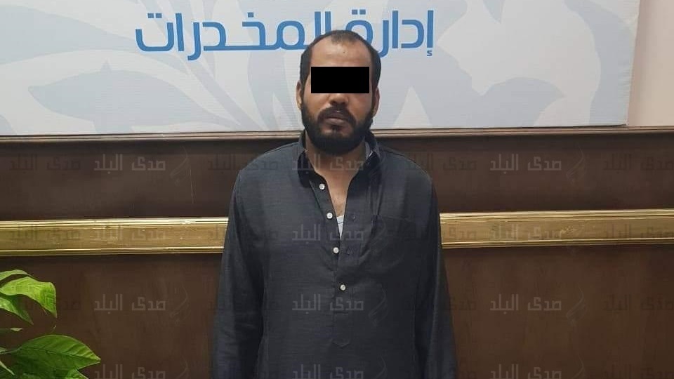 المتهم بعد ضبطه المتهم بعد ضبطه