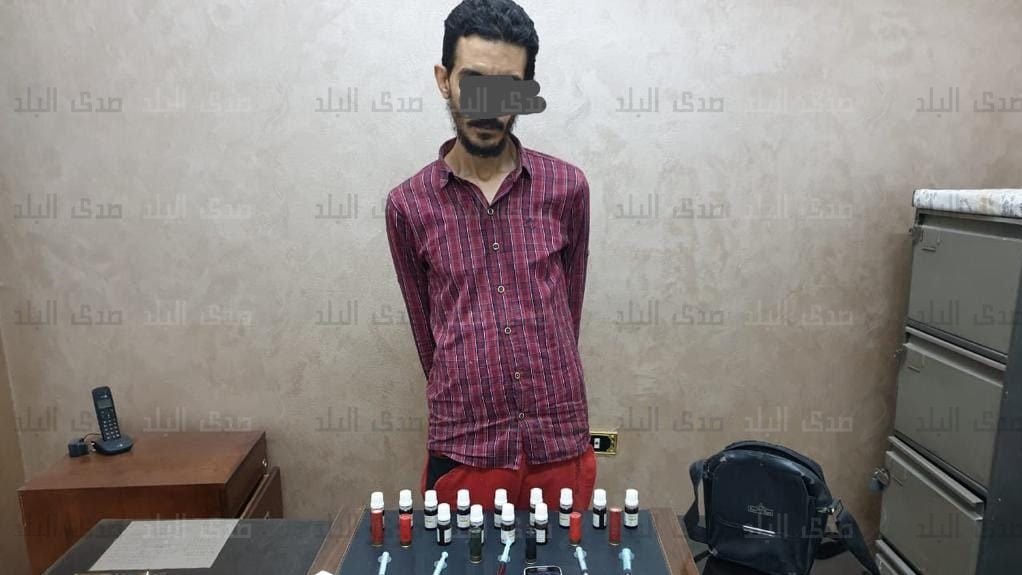 المتهم عقب ضبطه المتهم عقب ضبطه