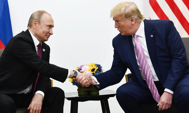 ترامب وبوتين خلال لقاء سابق