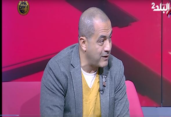 والد السباح محمد الحسينى