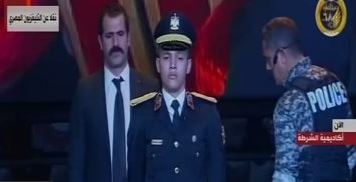 نجل الشهيد وائل طاحون فى احتفالية عيد الشرطة