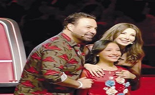 عاصي الحلاني والطفلة هايدي 