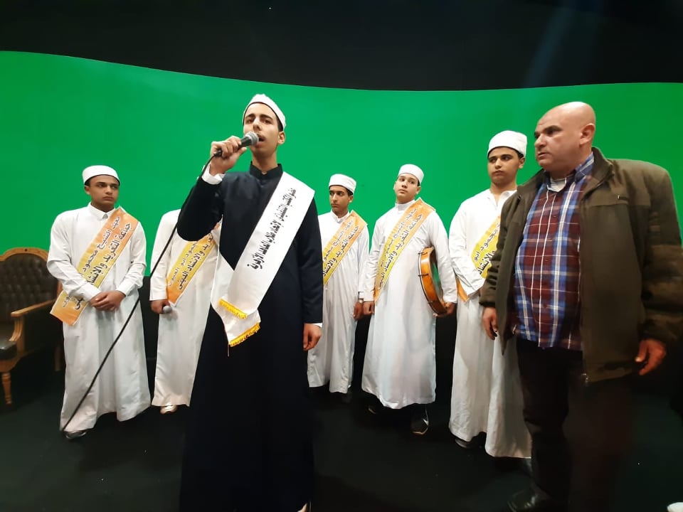 الابتهالات والأناشيد الدينية تجذب رواد جناح الأزهر 