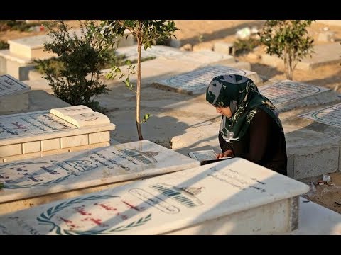 حكم كتابة اسم المتوفي على القبر