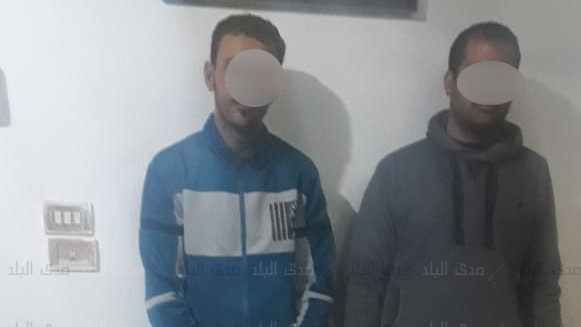 المتهمان عقب ضبطهما 
