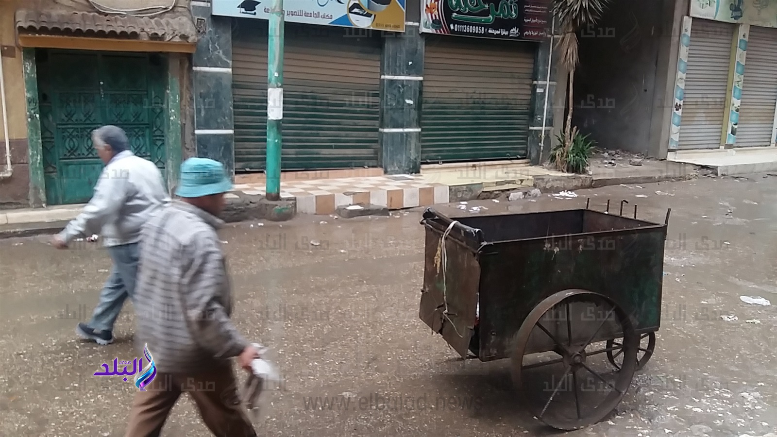 عمال النظافة بالقليوبية يتحدون الطقس السيئ