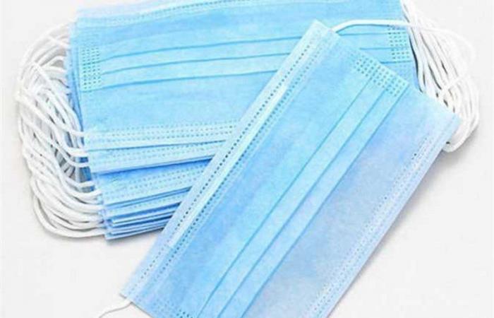 فى الموصل مصنع ألبسة سابق لداعش ينتج الكمامات