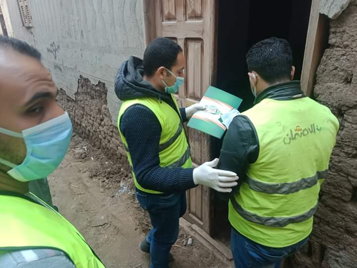 توزيع السلع الغذائية على العمالة غير المنتظمة