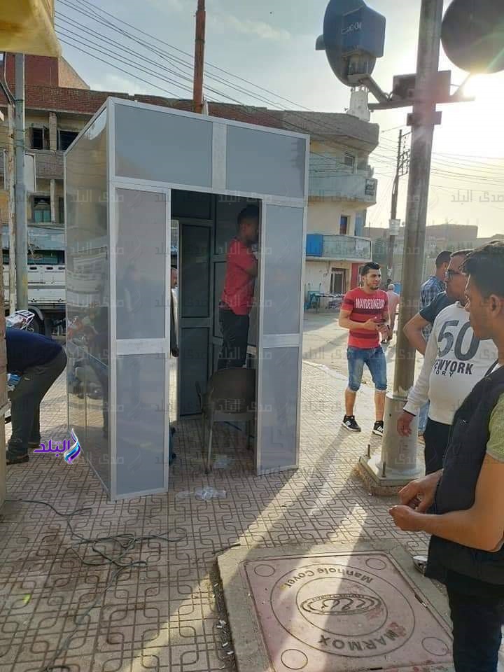 أهالي طنبدي بالمنوفية يشترون بوابة تعقيم 