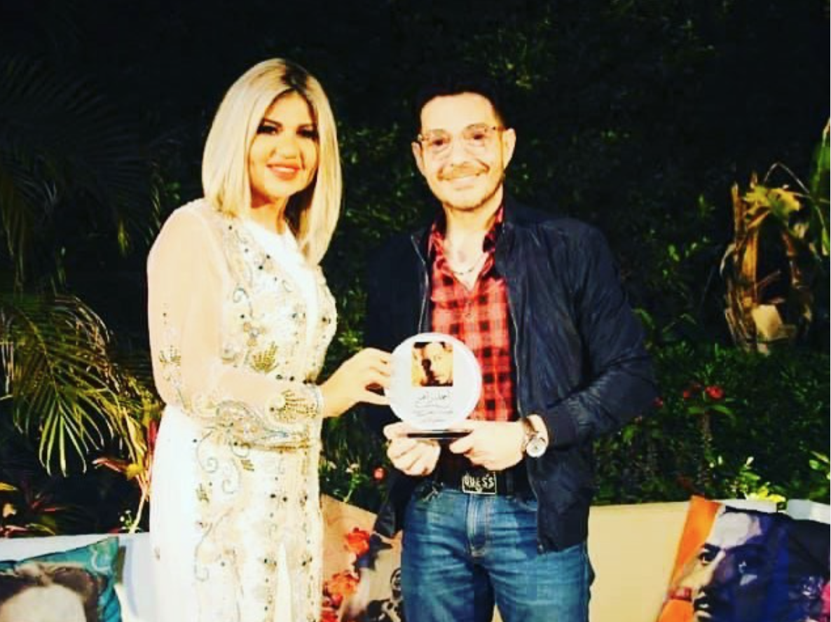 الاعلامية بوسي شلبي و احمد زاهر 