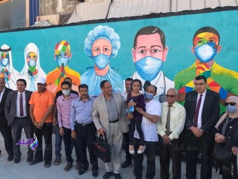 جدارية للعاملين بالقطاع الصحي في العريش
