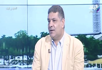 أشرف ابو الهول، مدير تحرير جريدة الاهرام 